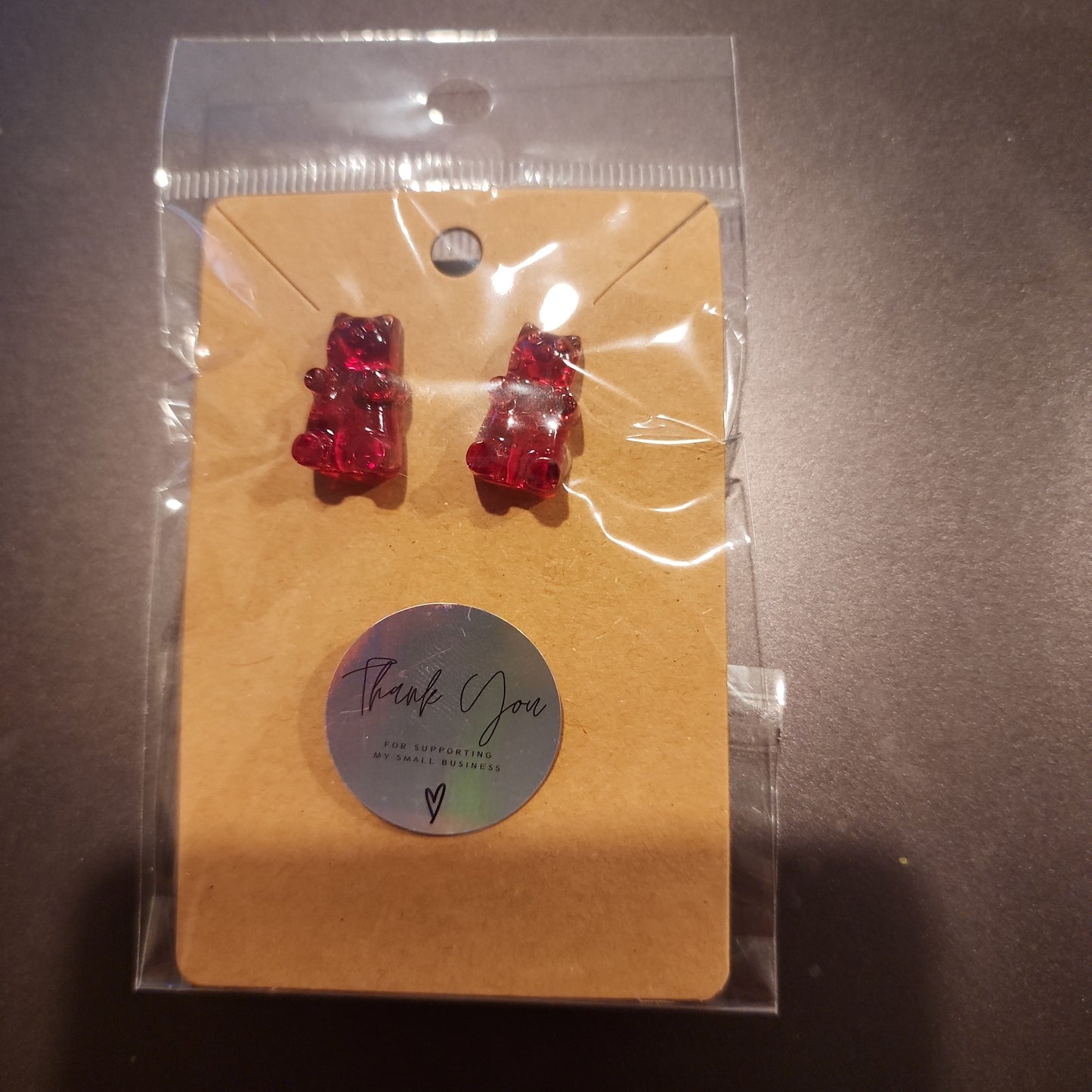 Red gummy bear studs