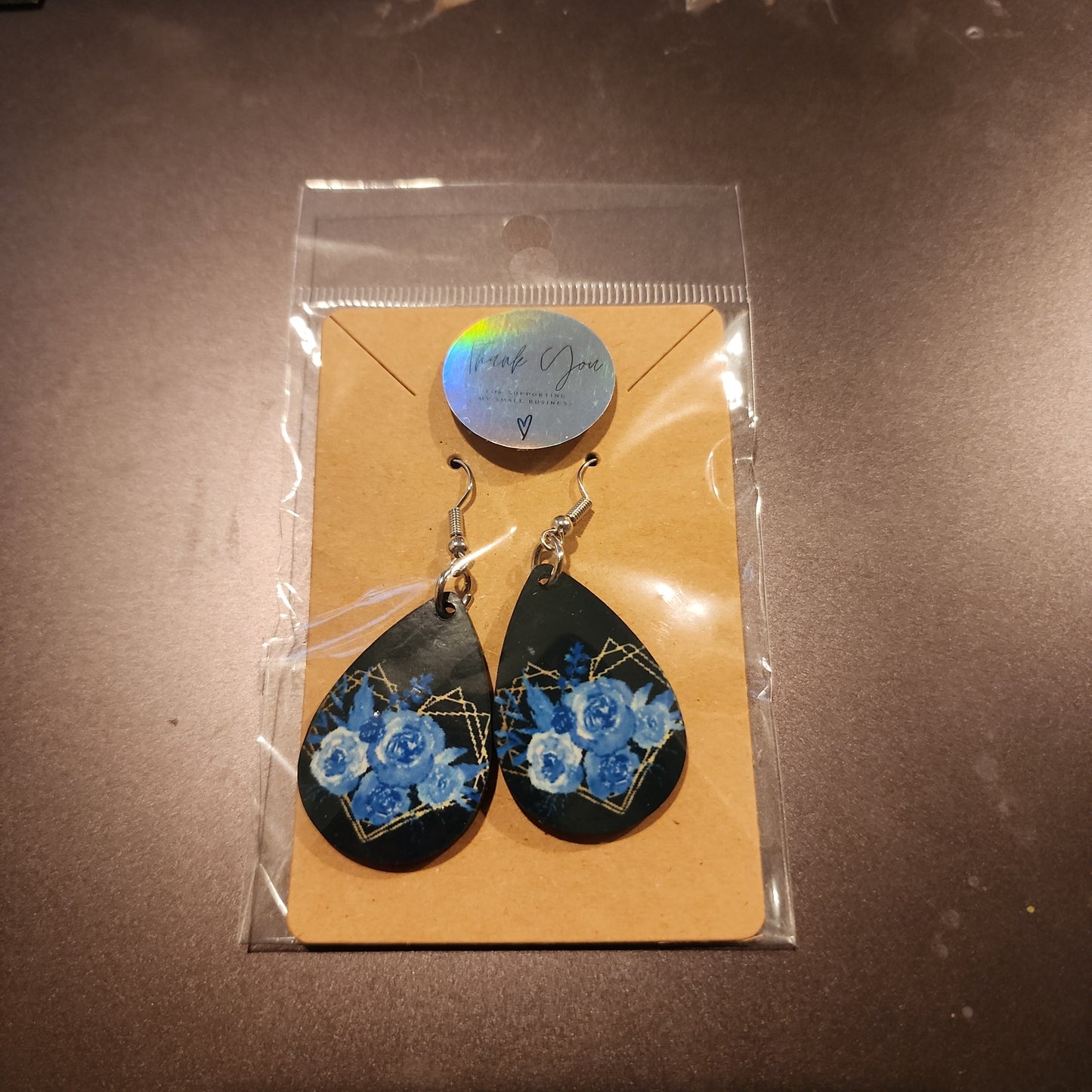 Blue rose, tear drop earrings.